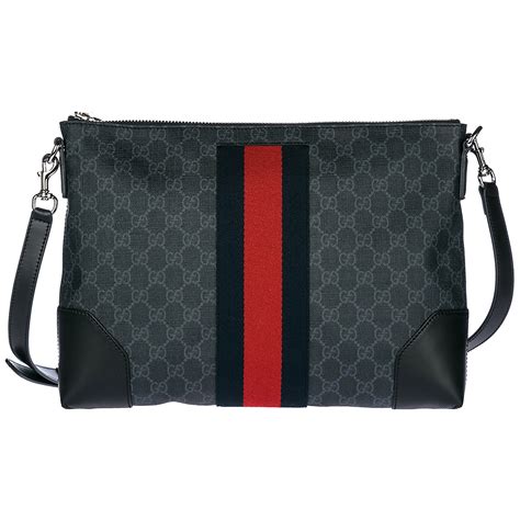 gucci canvas crossbody black|Gucci crossbody with striped strap.